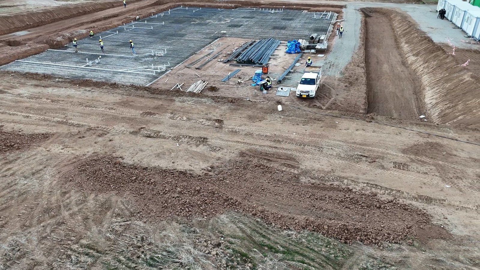Aerial view of prepared foundations, access areas and site facilities