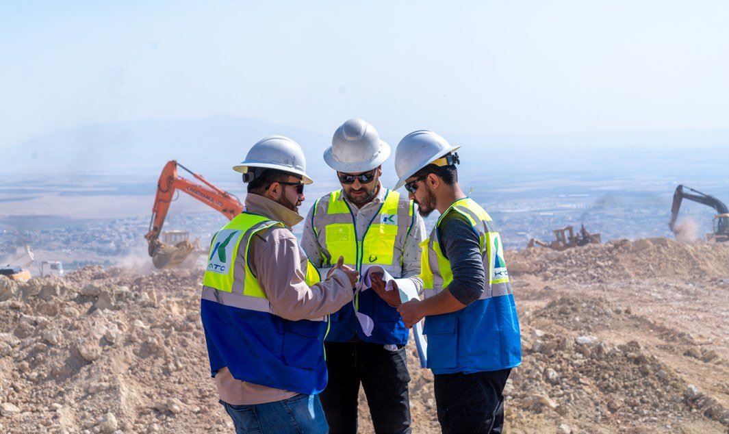 Construction professionals reviewing plans
